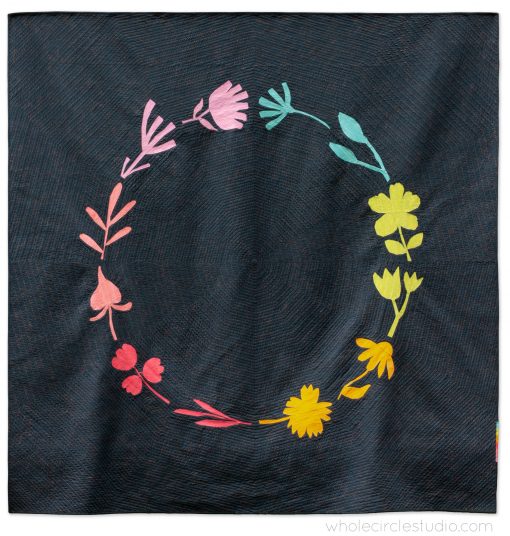 Botanical Beauties floral art texture rainbow quilt on a dark navy speckled background